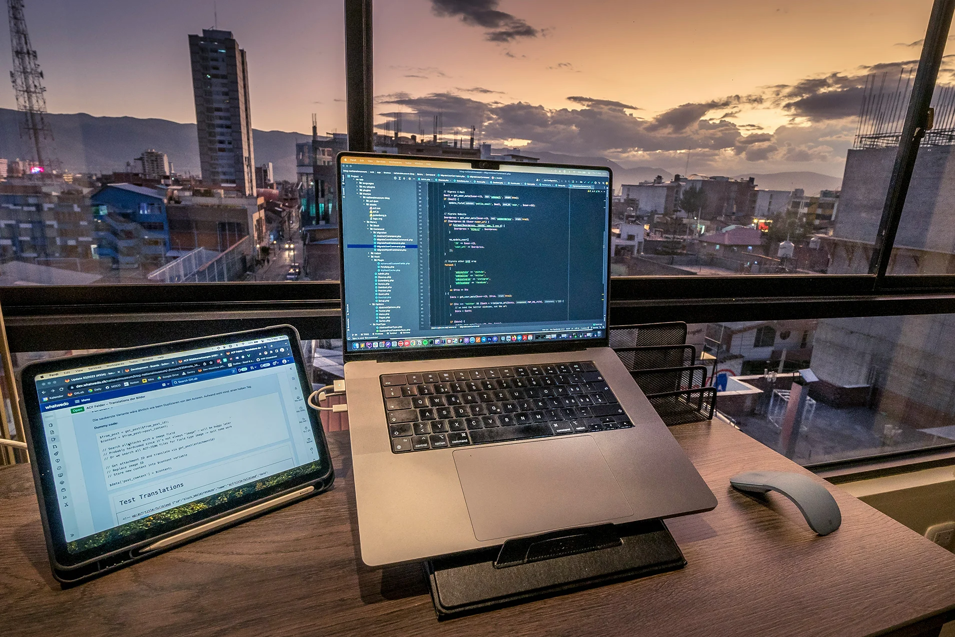 Laptop displaying code on a desk